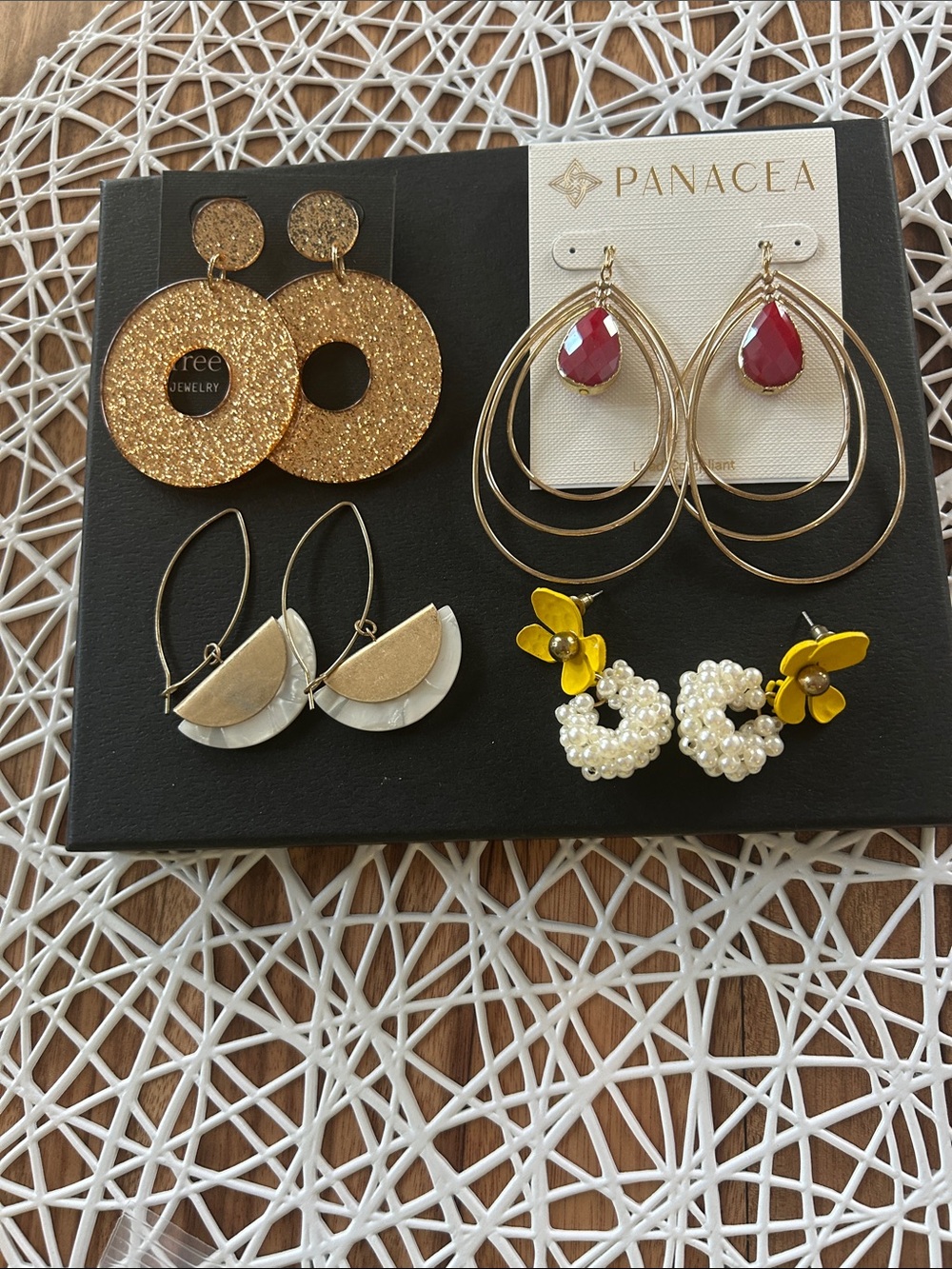 Bundle of 4 pairs of handmade and colorful earrings for pierced ears.